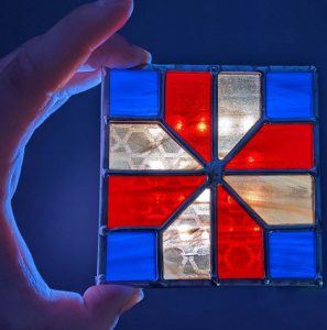 Interactive Stained-Glass: Exploring a new design space of traditional hybrid crafts for novel fabrication methods